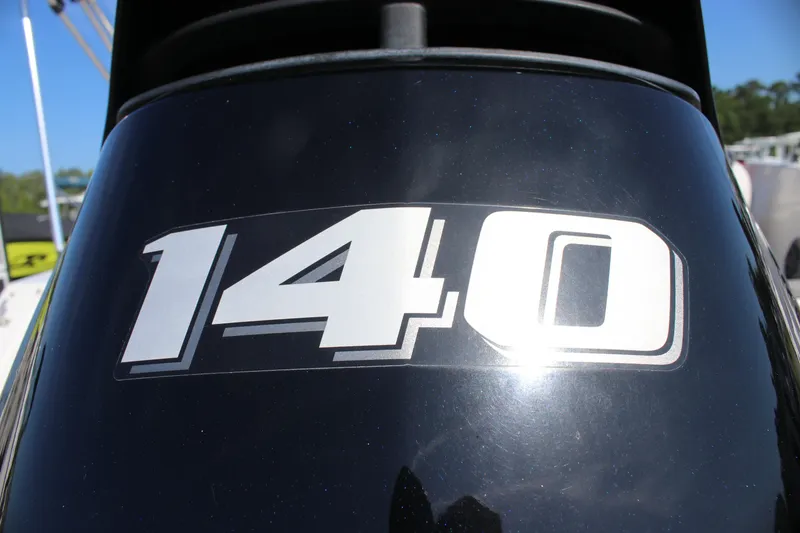 Slide: The Image of Close-up of 140 decal on 2021 Starcraft SVX 191 OB boat engine. - 12