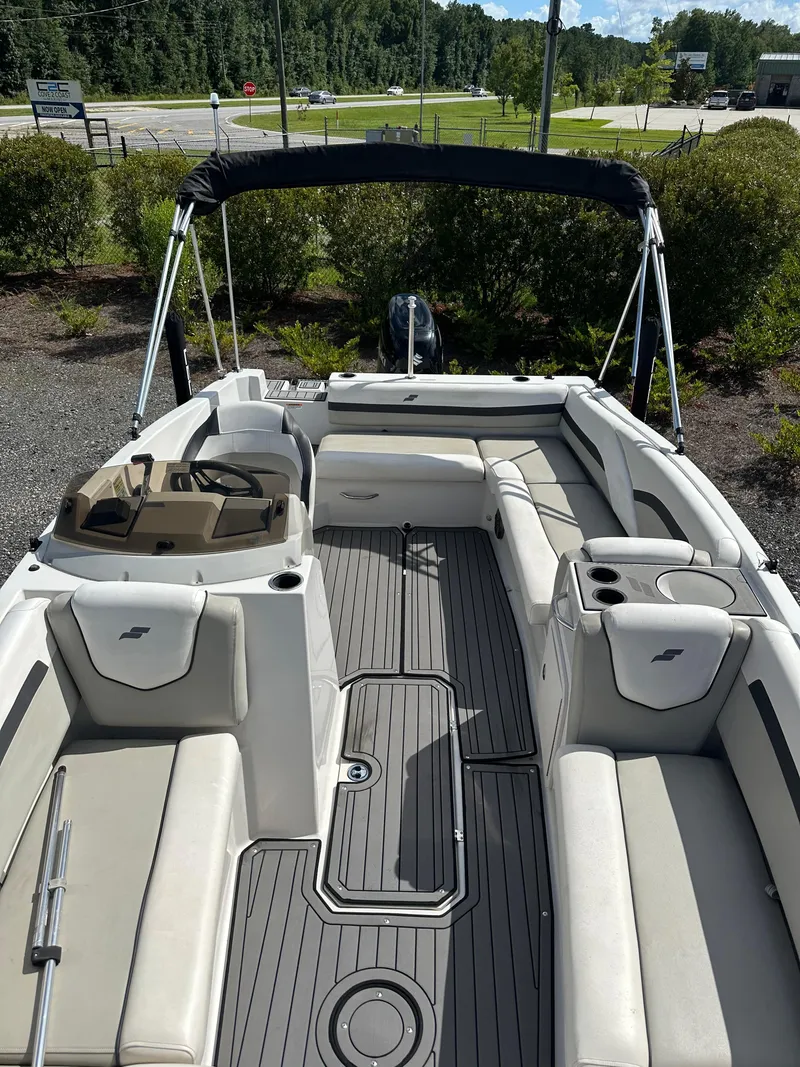 Slide: The Image of 2021 Starcraft SVX 191 OB boat interior with seating and steering console. - 18