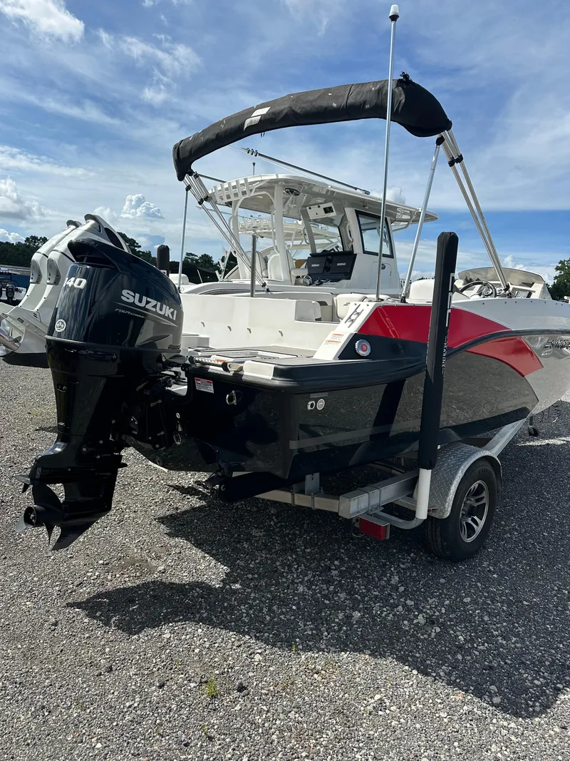 Slide: The Image of 2021 Starcraft SVX 191 OB boat with Suzuki outboard motor on trailer. - 8