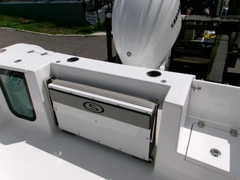 Slide: The Image of 2026 Sportsman Open 232 Center Console boat with Yamaha engine, featuring sleek design and storage. - 10