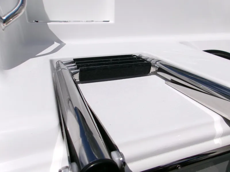 Slide: The Image of 2026 Sportsman Open 232 Center Console boat ladder detail. - 7