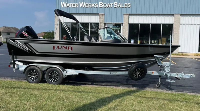 Slide: The Image of 2026 Lund 2075 Fisherman boat on trailer at Water Werks Boat Sales. - 2
