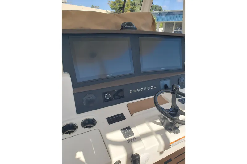 Slide: The Image of 2026 Regulator 35 boat interior with white seating and modern design. - 19