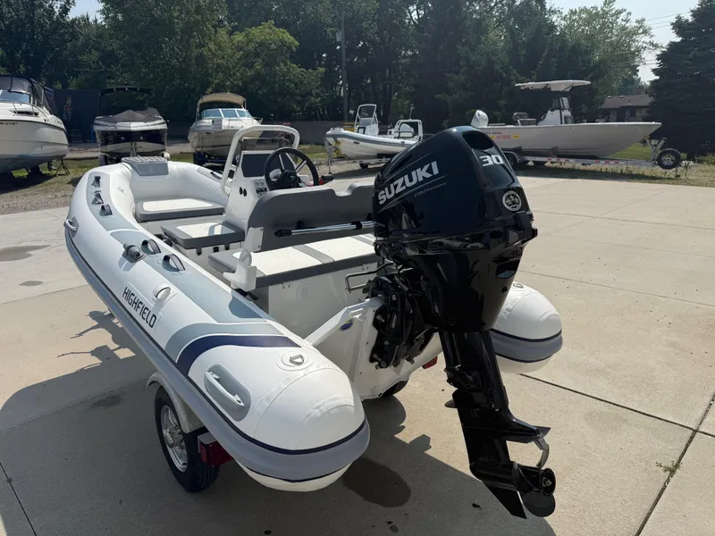 Slide: The Image of 2024 Highfield Classic 360 GT inflatable boat with Suzuki outboard motor. - 3