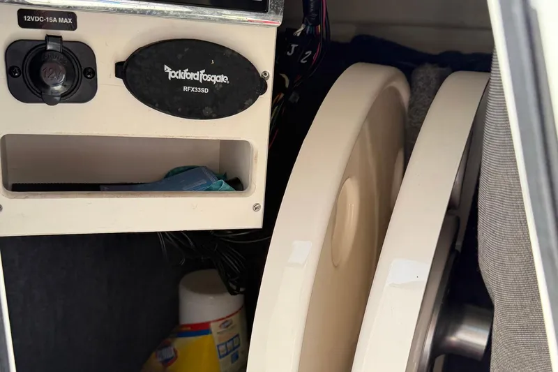 Slide: The Image of Interior of 2014 Sea Ray 240 Sundeck Outboard with Rockford Fosgate audio system. - 7