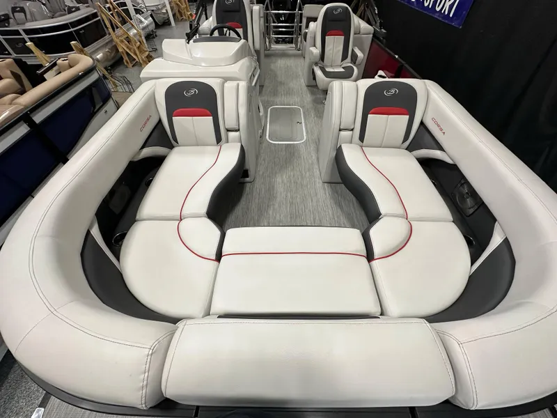 Slide: The Image of 2021 Barletta 23QCSS pontoon boat interior with plush seating and modern design. - 14