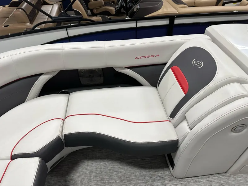 Slide: The Image of 2021 Barletta 23QCSS boat interior with white and red cushioned seating. - 18