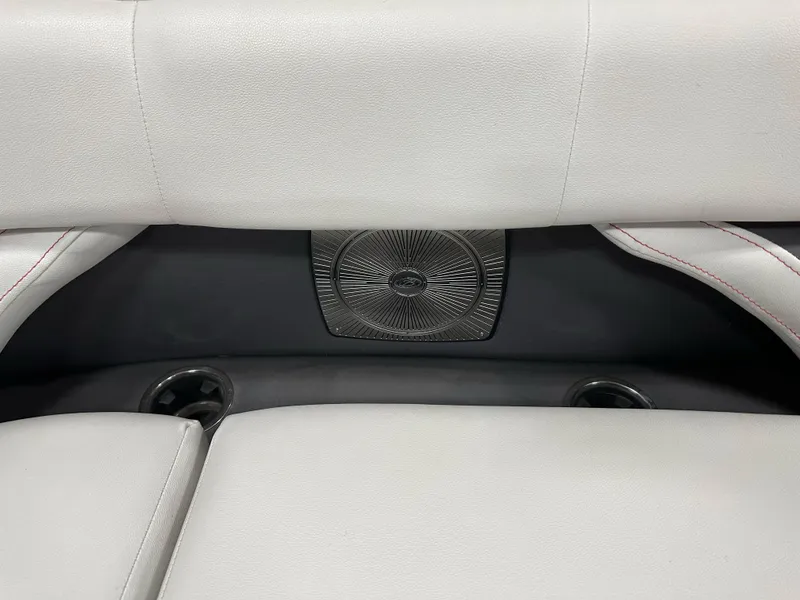 Slide: The Image of 2021 Barletta 23QCSS boat interior with white seating and cup holders. - 29