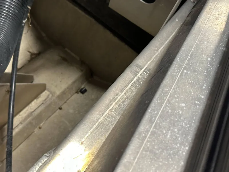 Slide: The Image of Close-up of a 2021 Barletta 23QCSS boat interior, showing structural details. - 34