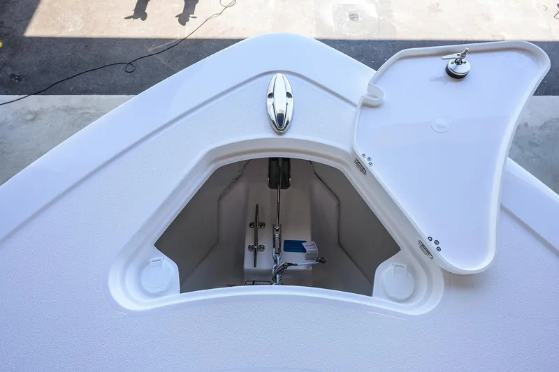 Slide: The Image of Open storage compartment on 2026 Sportsman Heritage 321 Center Console boat. - 13