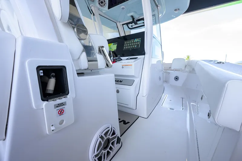 Slide: The Image of 2026 Sportsman Heritage 321 Center Console interior with advanced controls and seating. - 19