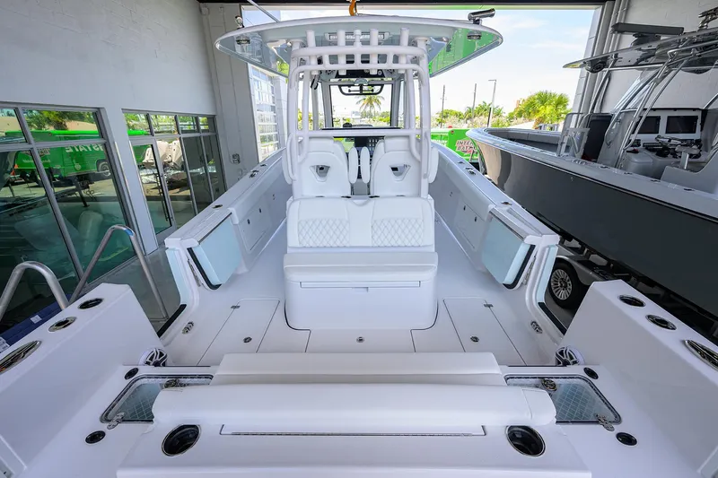 Slide: The Image of 2026 Sportsman Heritage 321 Center Console boat interior in showroom. - 32