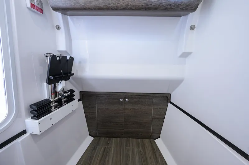 Slide: The Image of 2026 Sportsman Heritage 321 Center Console interior with storage and modern design. - 40