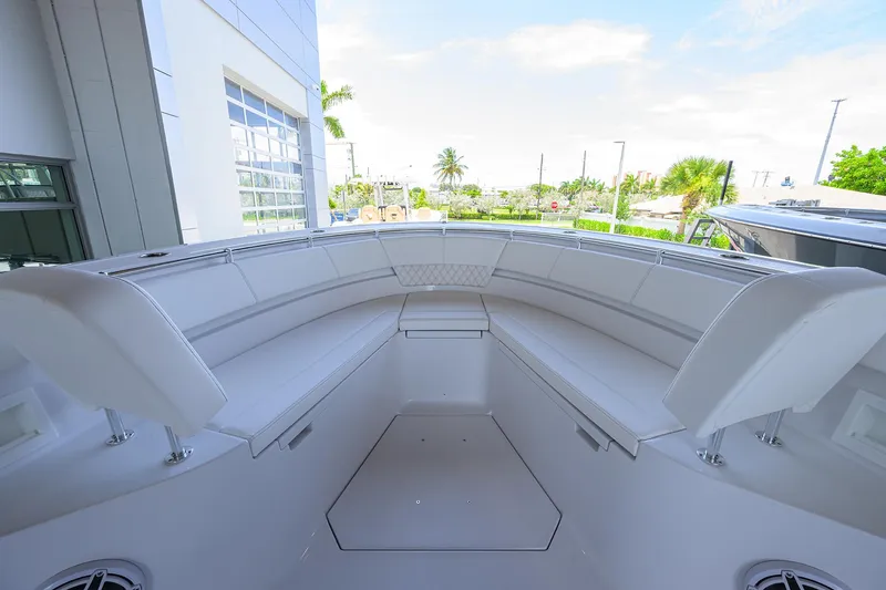 Slide: The Image of 2026 Sportsman Heritage 321 Center Console boat with spacious seating area. - 7