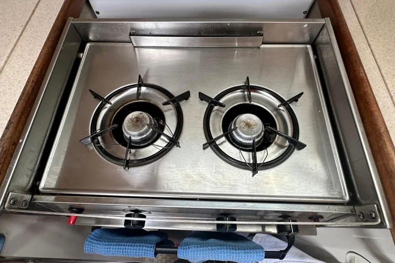 Slide: The Image of Stainless steel two-burner stove on a 1999 Catalina 320 yacht. - 14