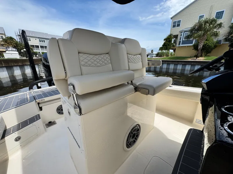 Slide: The Image of 2026 Scout 281 XSS boat interior with luxurious seating and modern design. - 14
