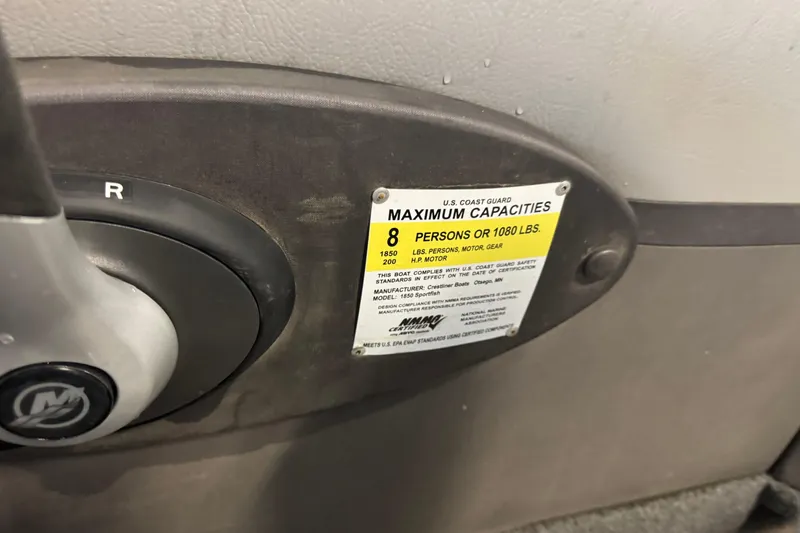 Slide: The Image of 2017 Crestliner 1850 Sportfish Outboard capacity label, maximum 8 persons or 1080 lbs. - 13