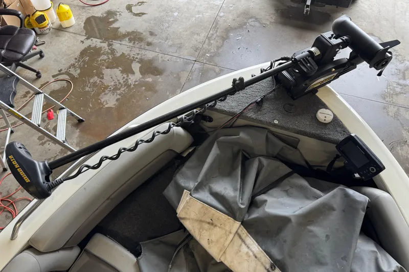 Slide: The Image of 2017 Crestliner 1850 Sportfish Outboard with trolling motor and fish finder in garage. - 16