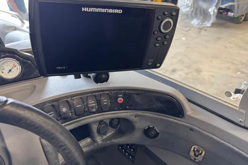 Slide: The Image of Control panel of a 2017 Crestliner 1850 Sportfish Outboard with Humminbird Helix 7 display. - 9