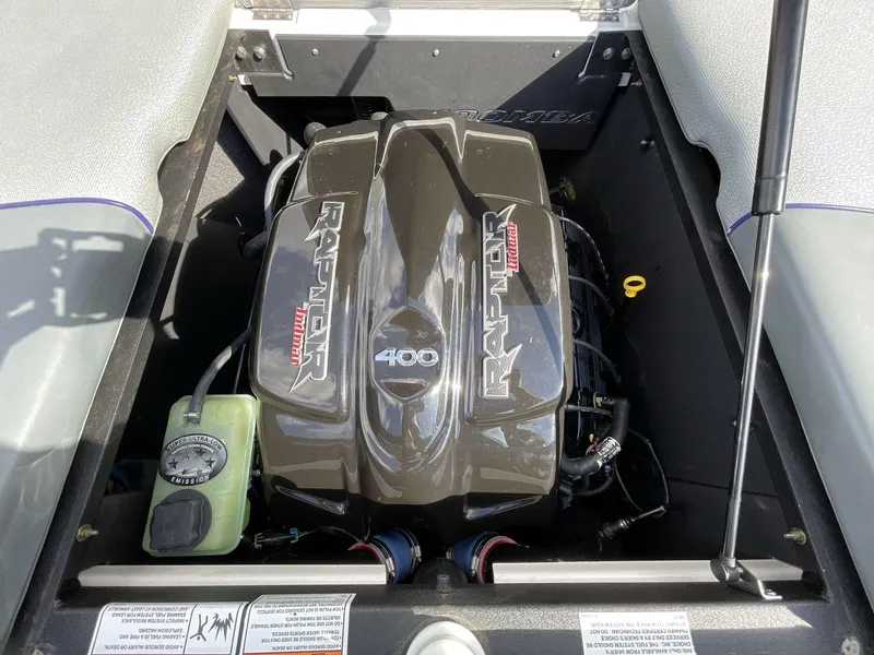 Slide: The Image of 2015 Moomba Mobius LSV engine compartment featuring a Raptor 400 motor. - 13