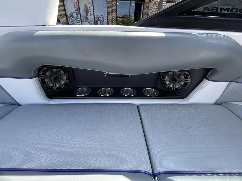 Slide: The Image of 2015 Moomba Mobius LSV interior with speakers and cup holders. - 21