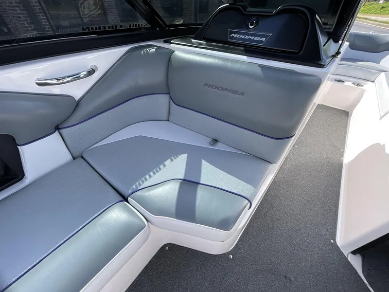 Slide: The Image of 2015 Moomba Mobius LSV interior with gray seating and sleek design. - 22
