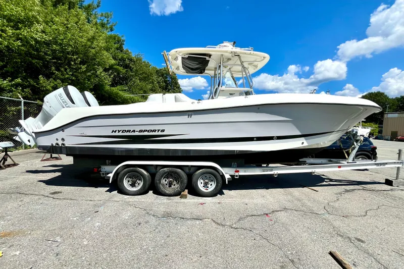 The Image of 2006 Hydra-Sports Vector 2900 CC boat on trailer under blue sky. - 0