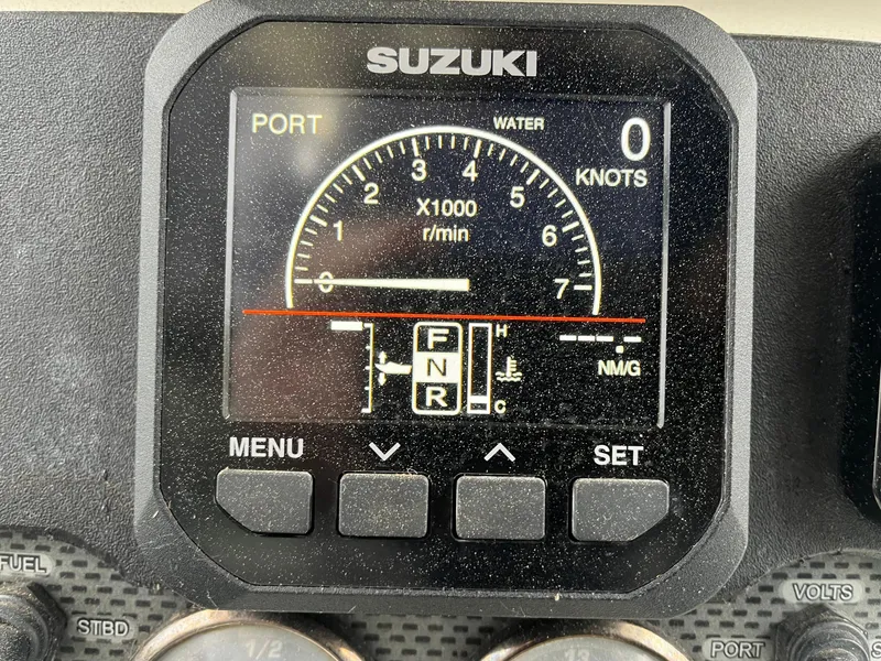 Slide: The Image of Suzuki boat gauge display on 2006 Hydra-Sports Vector 2900 CC dashboard. - 17