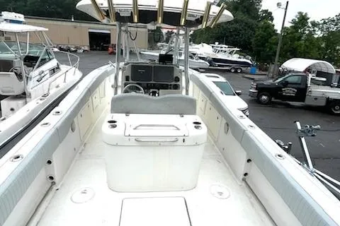 Slide: The Image of 2006 Hydra-Sports Vector 2900 CC boat, spacious deck, equipped for fishing, docked in a marina. - 21