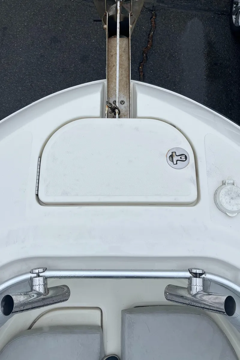 Slide: The Image of 2006 Hydra-Sports Vector 2900 CC boat deck with storage hatch and rod holders. - 24