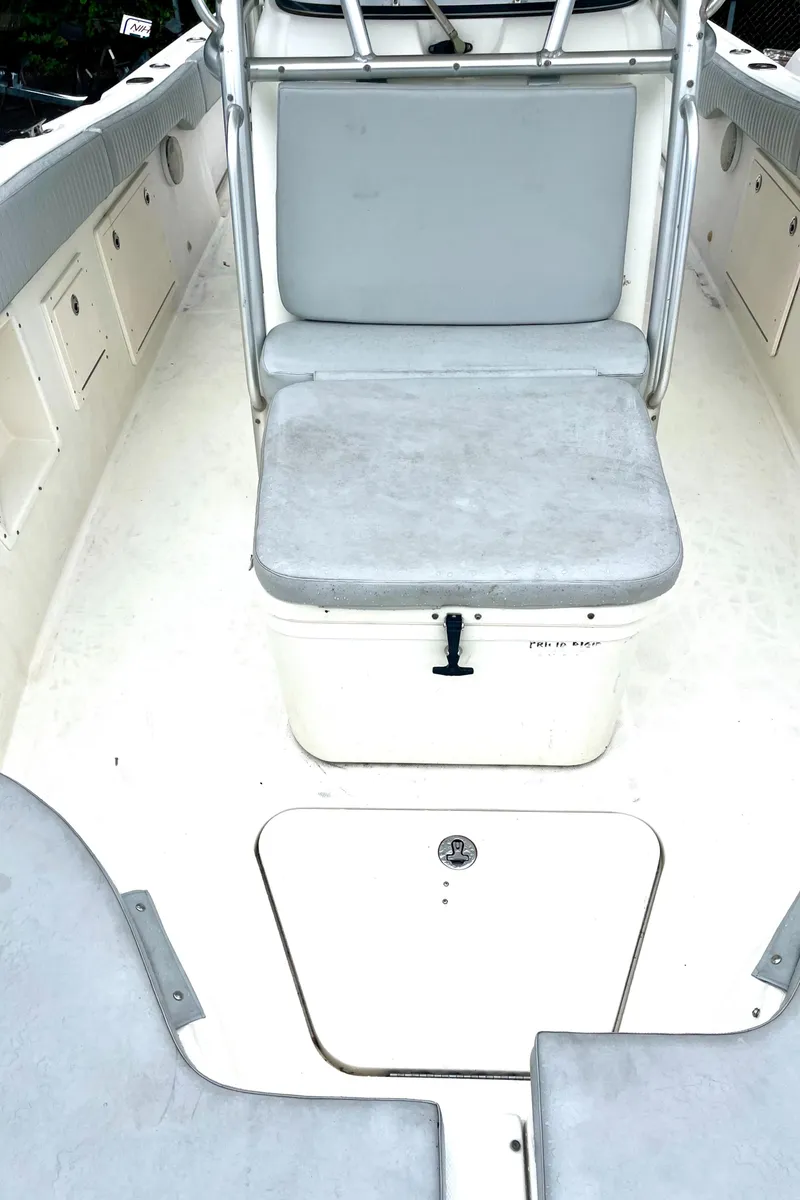 Slide: The Image of 2006 Hydra-Sports Vector 2900 CC boat interior with seating and storage compartments. - 26