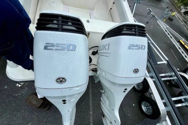 Slide: The Image of Twin Suzuki 250 outboard motors on a 2006 Hydra-Sports Vector 2900 CC boat. - 31