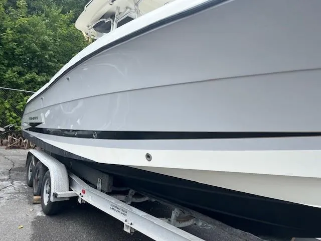 Slide: The Image of 2006 Hydra-Sports Vector 2900 CC boat on a trailer, side view. - 4