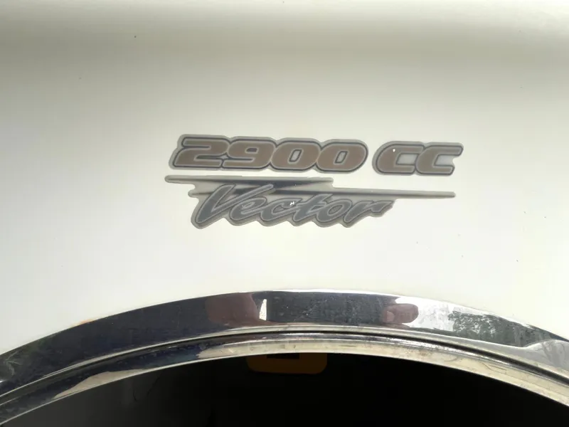 Slide: The Image of 2006 Hydra-Sports Vector 2900 CC logo on white surface. - 8