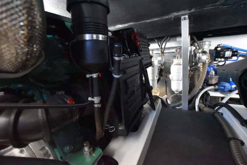 Slide: The Image of Engine room of 2019 Beneteau Swift Trawler 44, showcasing mechanical components and systems. - 36