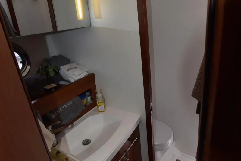 Slide: The Image of Bathroom interior of 2019 Beneteau Swift Trawler 44, featuring sink and toilet. - 38