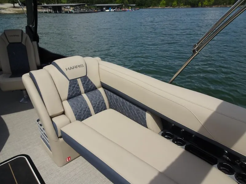 Slide: The Image of Luxurious seating on 2025 Harris Grand Mariner 250 pontoon boat, with lake view. - 19