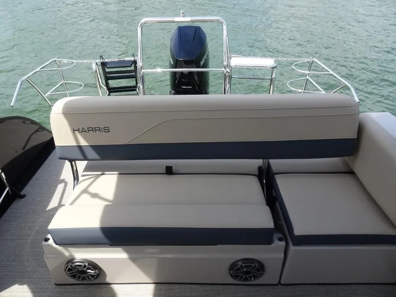 Slide: The Image of 2025 Harris Grand Mariner 250 boat interior with seating and water view. - 22