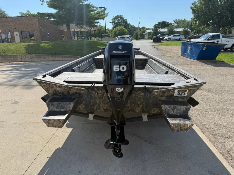 Slide: The Image of 2022 Lowe Roughneck RX2070 Tiller boat with Mercury 60 HP engine, parked outdoors. - 6