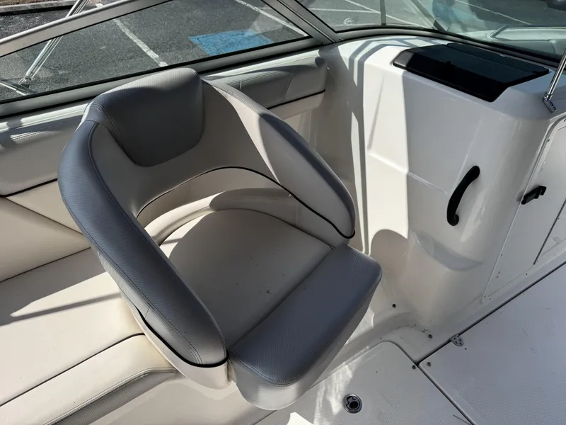 Slide: The Image of 2012 Yamaha Boats SX210 interior with gray seating and white deck. - 10