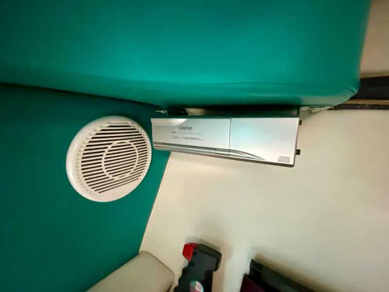 Slide: The Image of 1999 Checkmate 259 Convincer interior with Clarion stereo and speaker system. - 29