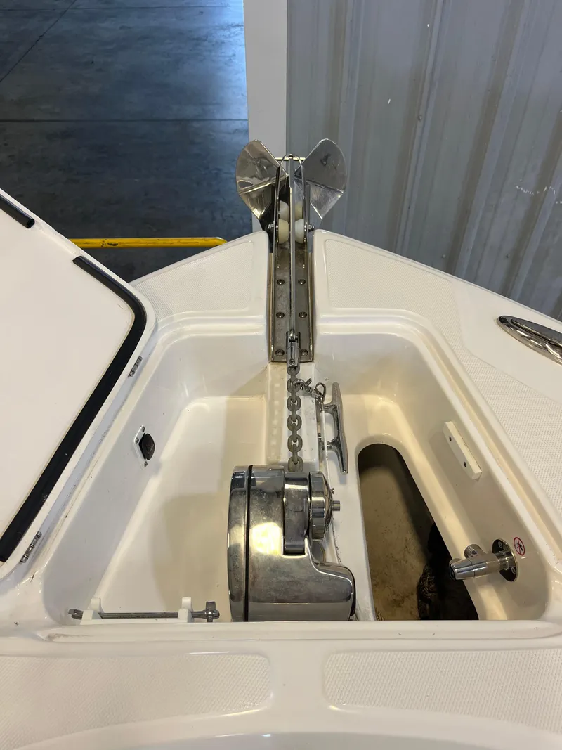Slide: The Image of Anchor system of a 2020 Edgewater 320CC boat in a storage area. - 5