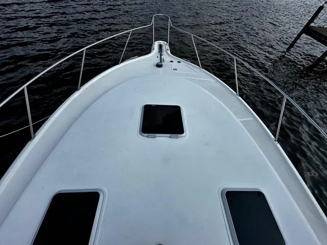 Slide: The Image of Helm of 2003 Tiara Yachts 3500 Express with navigation controls and gauges. - 20