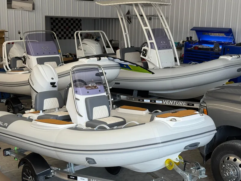 Slide: The Image of 2026 Gala V500 boats in showroom, featuring sleek design and modern equipment. - 9