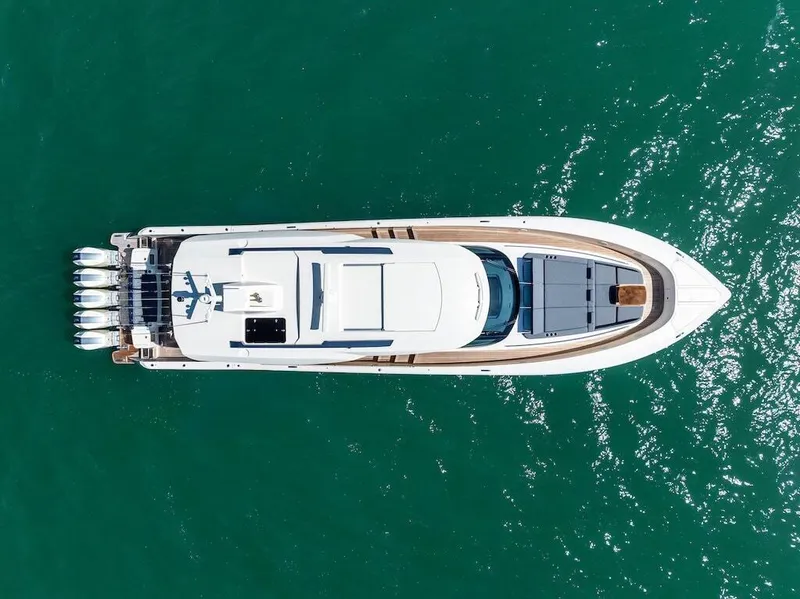 Slide: The Image of Aerial view of 2025 Scout 670 LXS yacht on turquoise water. - 12