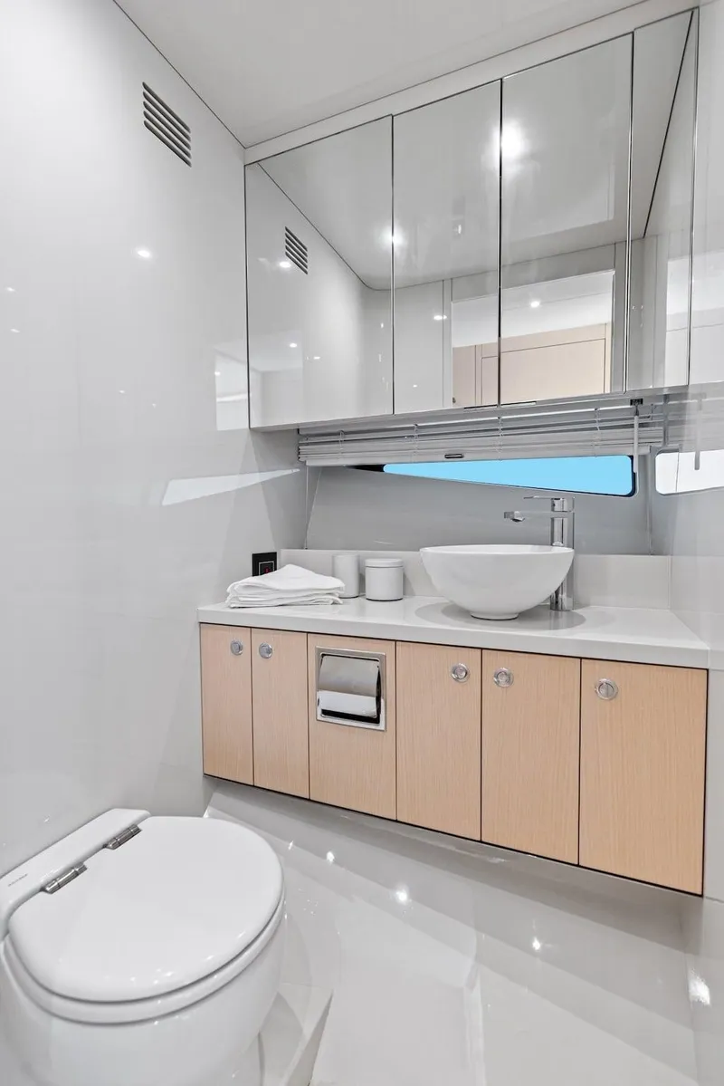 Slide: The Image of Luxurious bathroom in 2025 Scout 670 LXS yacht with modern fixtures and sleek design. - 4