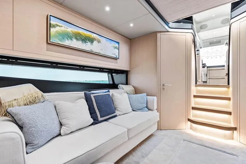 Slide: The Image of Luxurious interior of 2025 Scout 670 LXS yacht with modern decor and comfortable seating. - 7