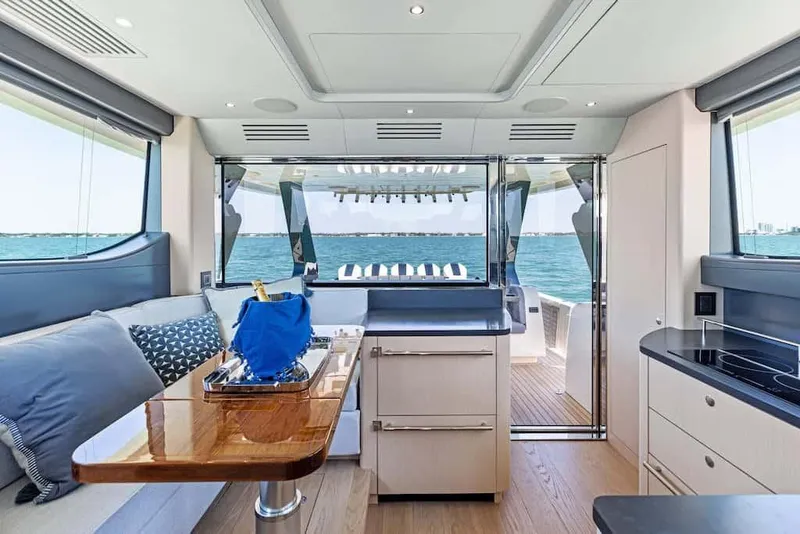 Slide: The Image of Luxurious interior of 2025 Scout 670 LXS yacht with ocean view and modern amenities. - 9