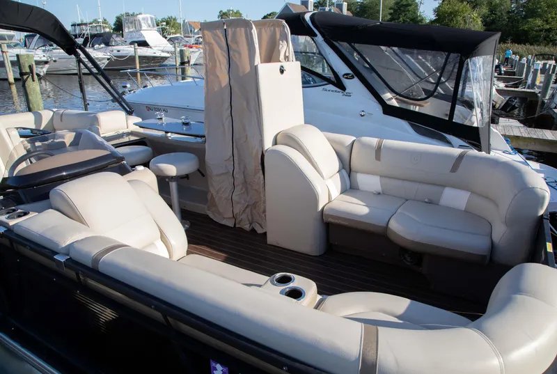 Slide: The Image of Luxurious 2018 Godfrey 255 ULB pontoon boat with spacious seating and elegant design. - 15