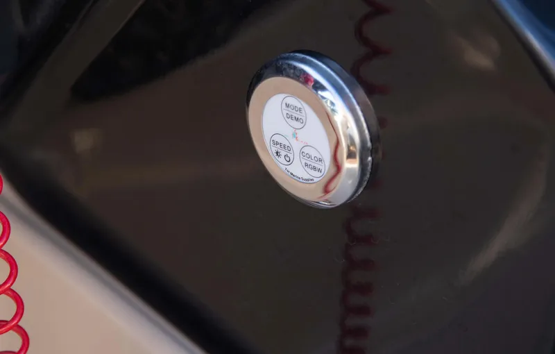 Slide: The Image of Fuel cap of 2018 Godfrey 255 ULB boat with red detailing. - 7